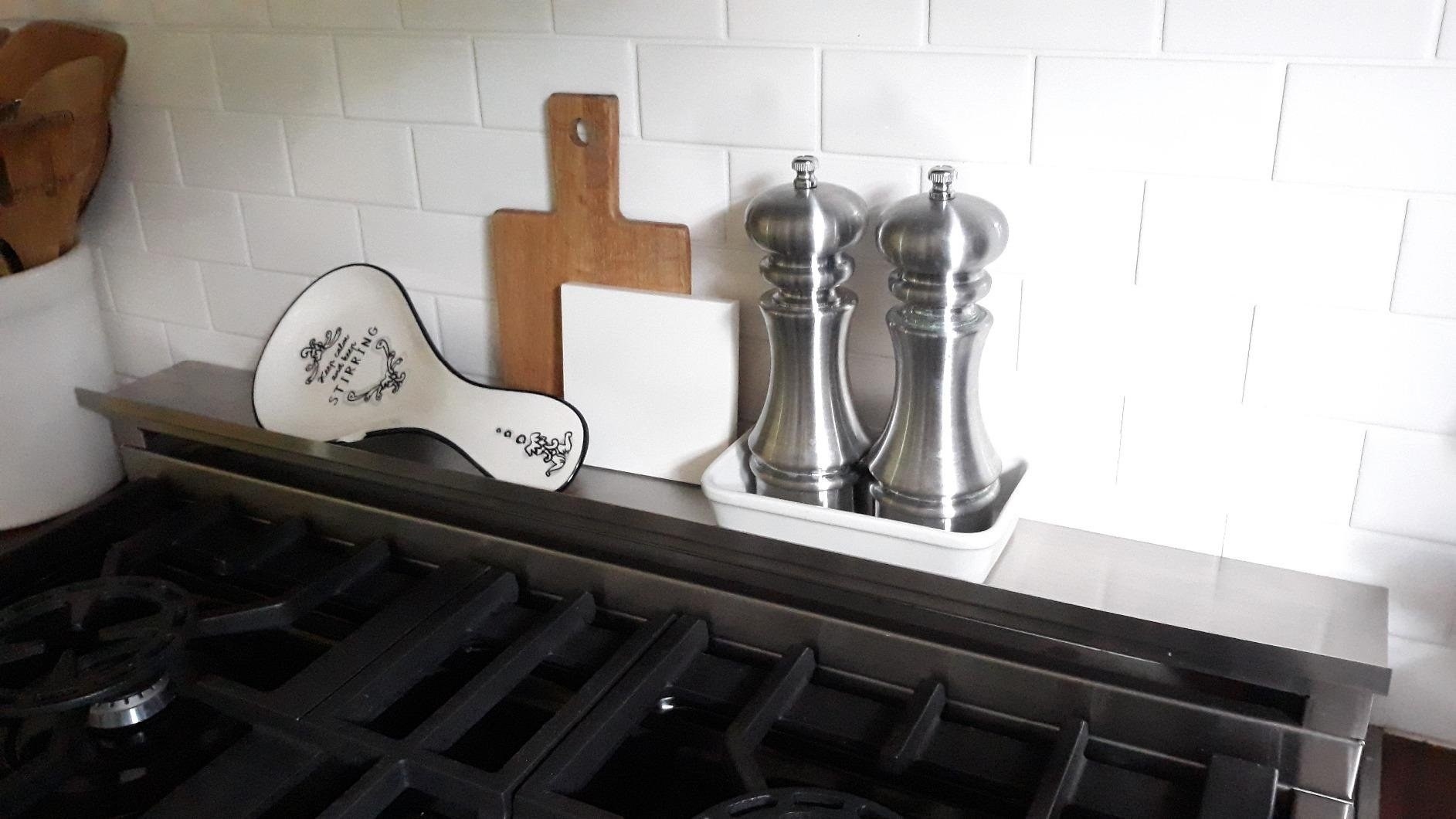 Reviewer image of magnetic shelf on stove