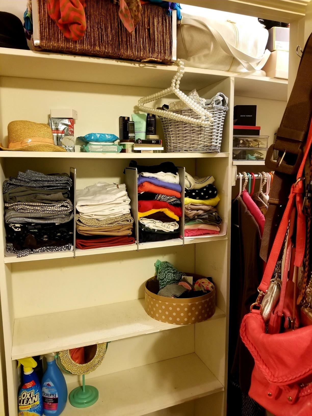 a reviewer picture of a closet with a neat shelf using the dividers