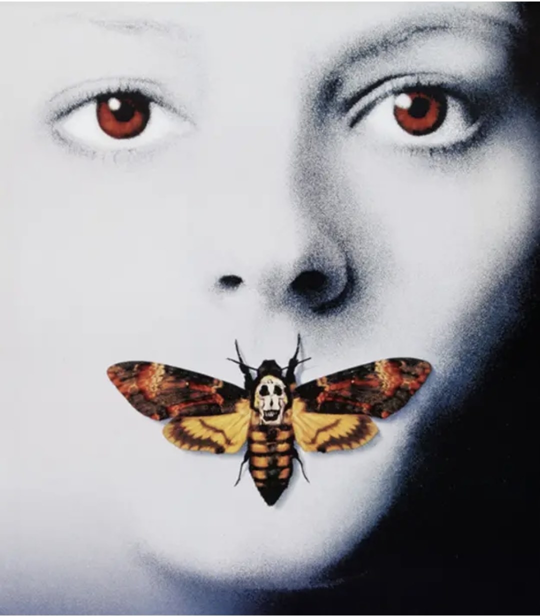 Jodie Foster and a butterfly over her mouth