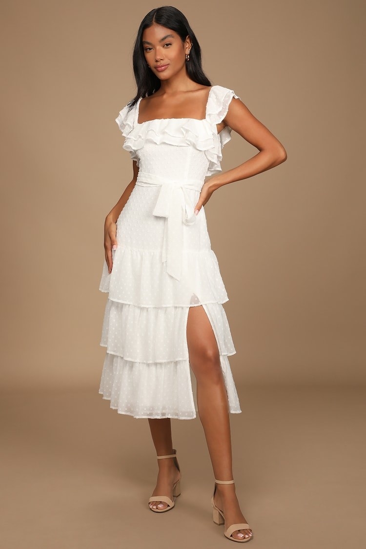 model wearing white ruffle midi dress