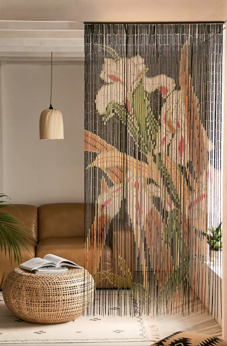 the black bamboo curtain with a large floral pattern