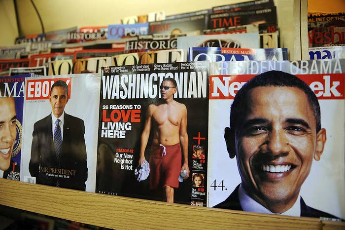 Close-up of magazines on display, including covers with Barack Obama