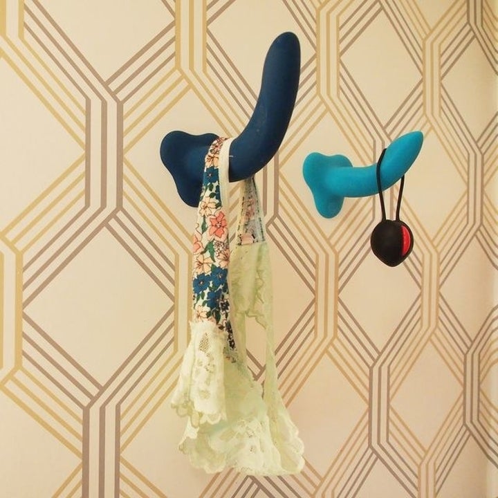 Dildos attached to wall