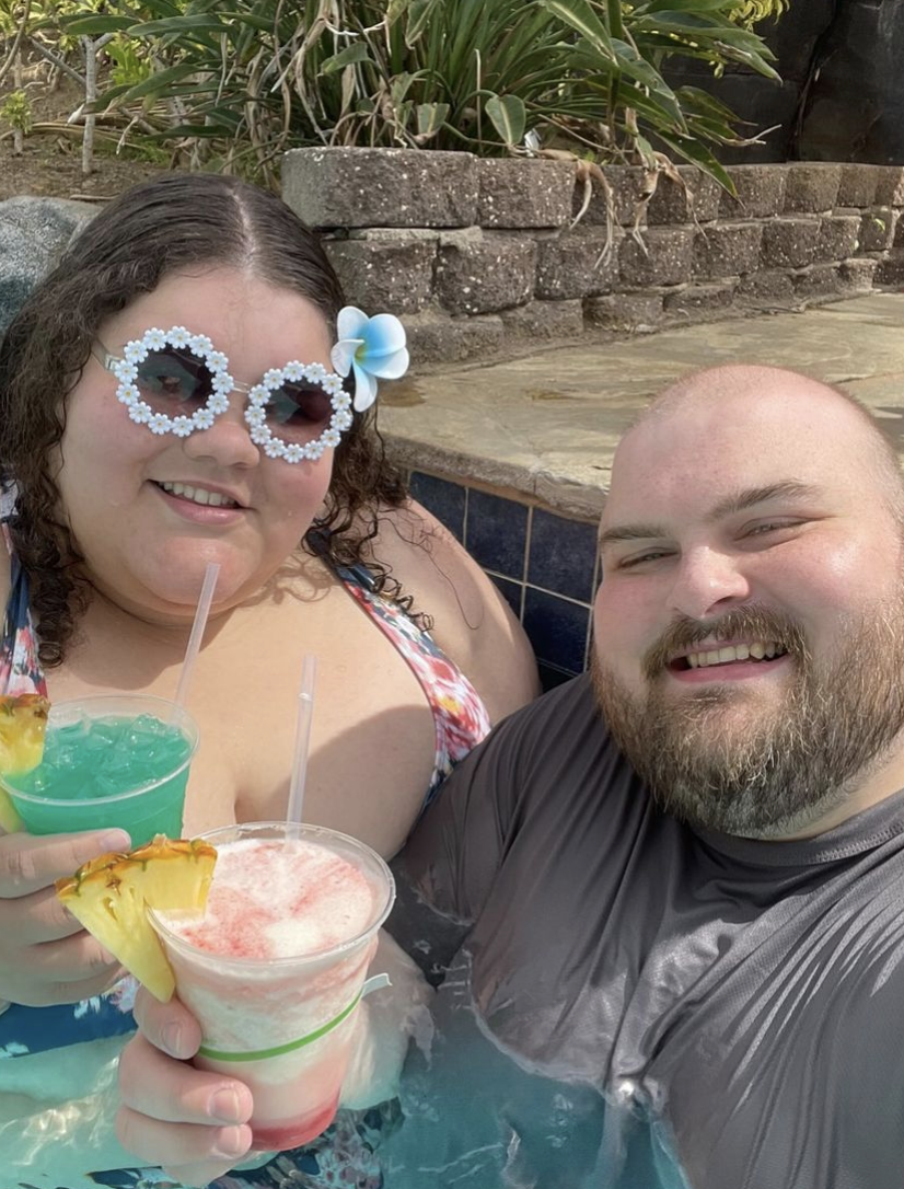 Jae in the pool with a frozen drink