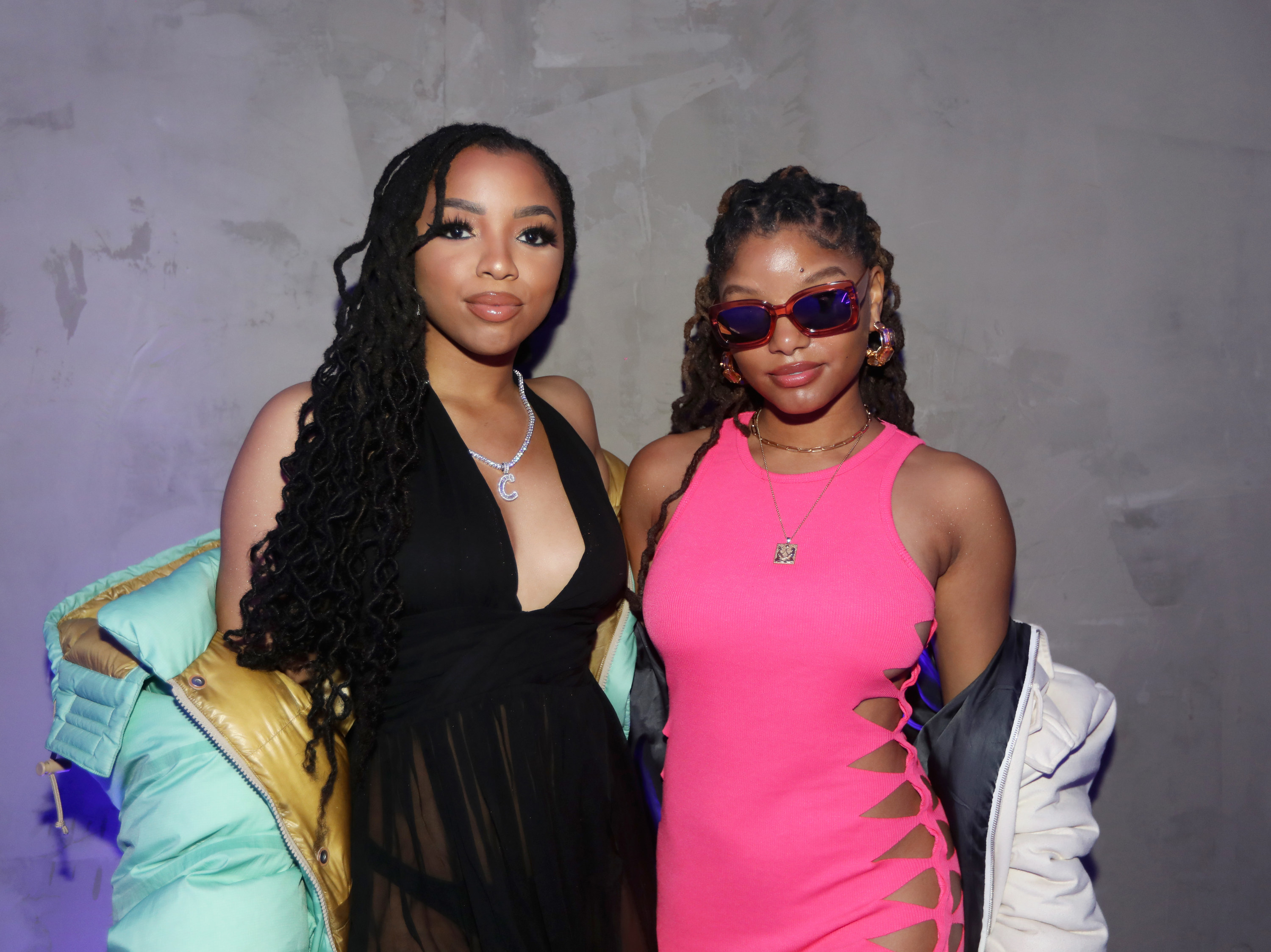 Chloe and Halle pose for a picture arm-in-arm