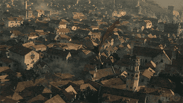 A dragon flying over the city in &quot;House of the Dragon&quot;