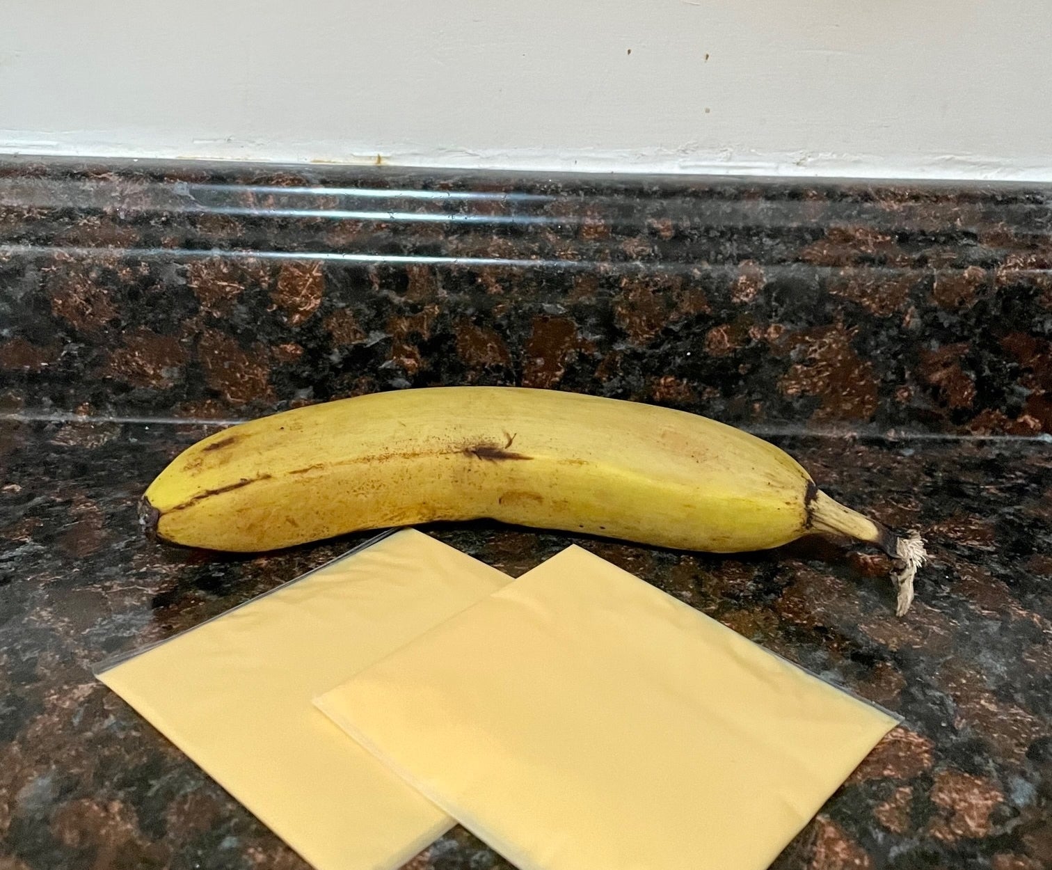 A banana and American cheese slices