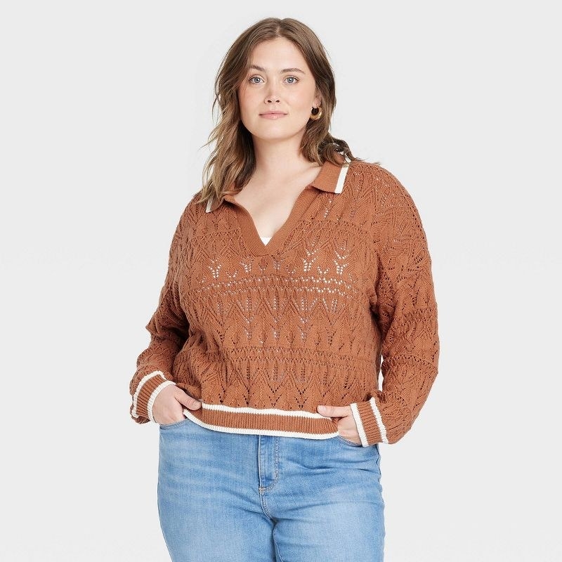 model wearing burnt orange collared polo sweater