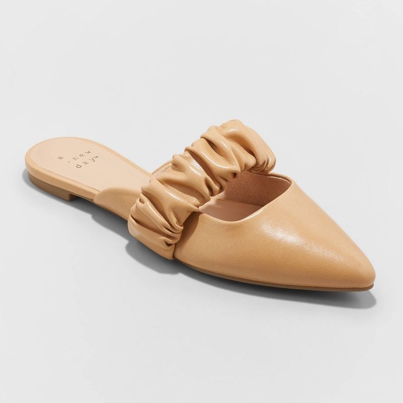 the tan mules with a scrunched strap