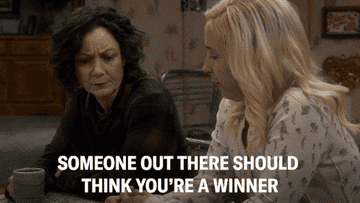 a woman saying to another woman, &quot;someone out there should think you&#x27;re a winner&quot;