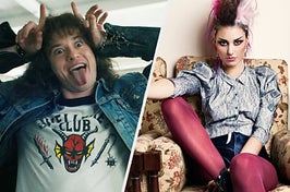 Eddie Munson wears a denim jacket while making devil horns with his fingers and a woman wears a shiny blouse and leggings under shorts