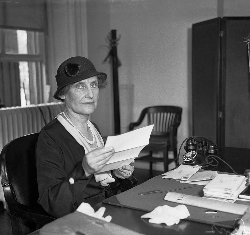 Nellie Tayloe Ross at a desk