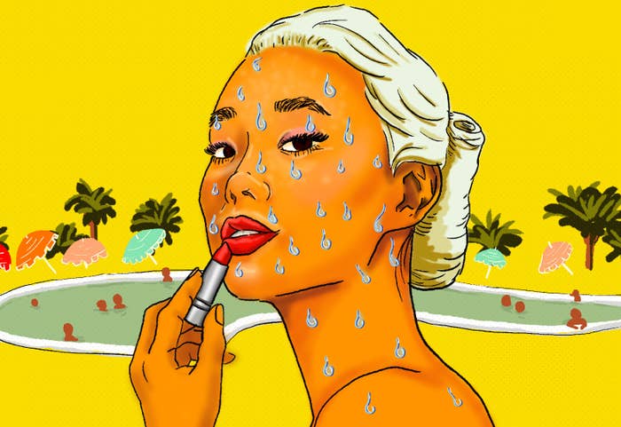 An illustration of a woman applying lipstick nearby a pool with sun umbrellas and palm trees in the background. She is wearing makeup that has not been smeared by the extreme amount of sweat thats on her face and shoulder.