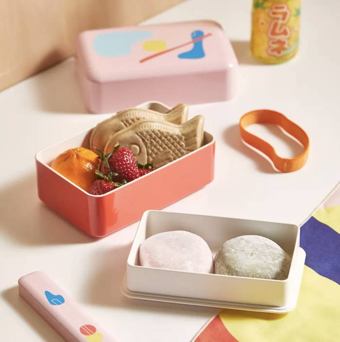 The bento box pieces laid out on a counter