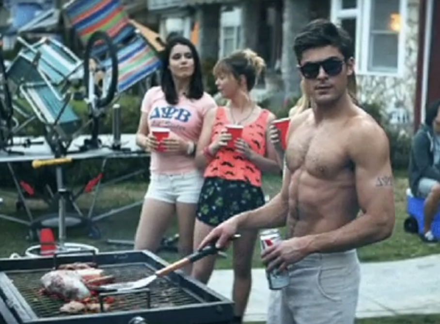 Zac Efron working the grill