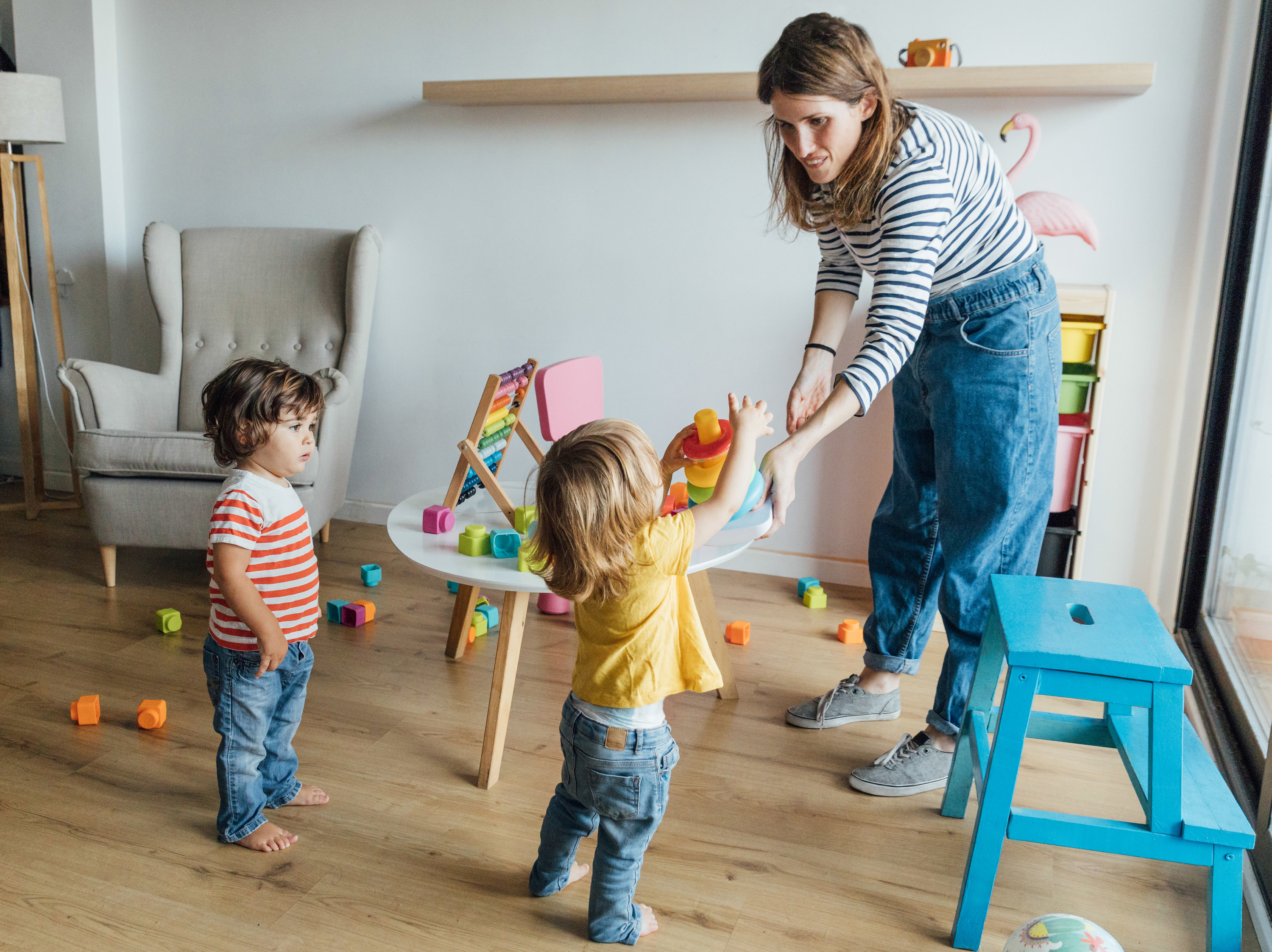 a babysitter playing with kids