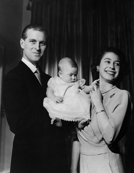 The Queen with baby Charles and Prince Philip