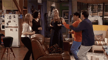 The friends from &quot;Friends&quot; jump around and hug in Monica&#x27;s apartment