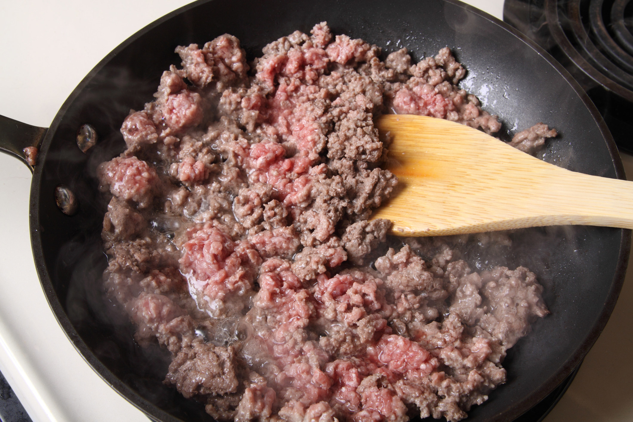 Ground meat in a hot pan