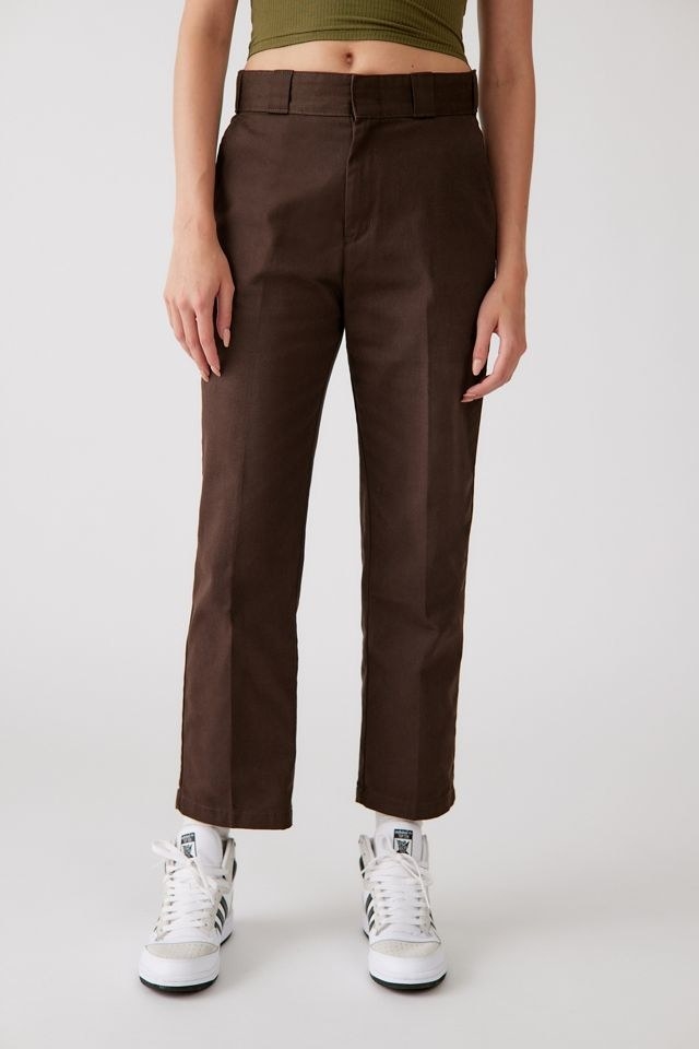 model in brown dickies trousers