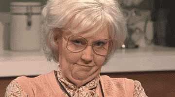 a woman on SNL winking