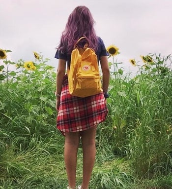 reviewer with the yellow backpack