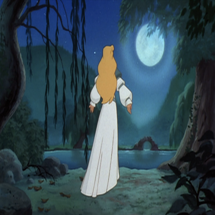 Odette with her back to us as she looks at a full moon;