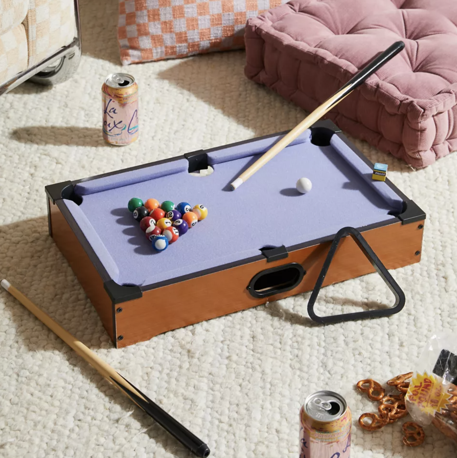 The pool table on a bedroom floor