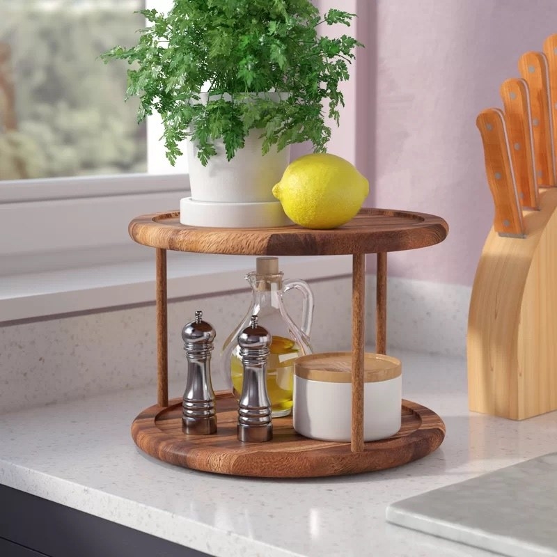 The double tier lazy Susan with kitchen items on it