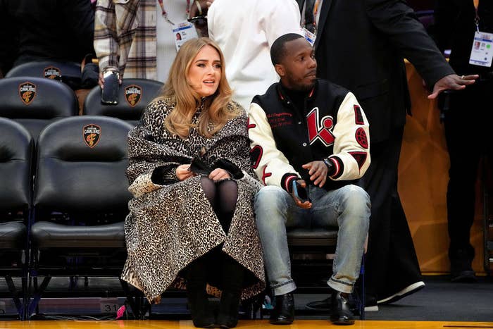 Adele and Rich Paul sitting courtside at a basketball game