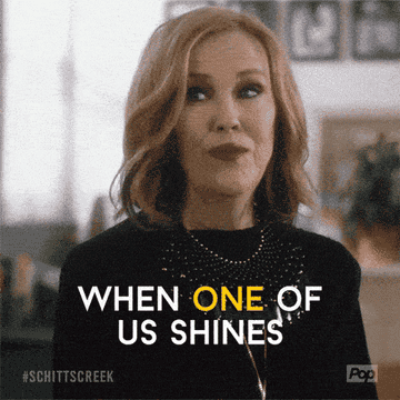 A gif of Moira Rose from Schitt&#x27;s Creek saying &quot;when one of us shines, all of us shine&quot;