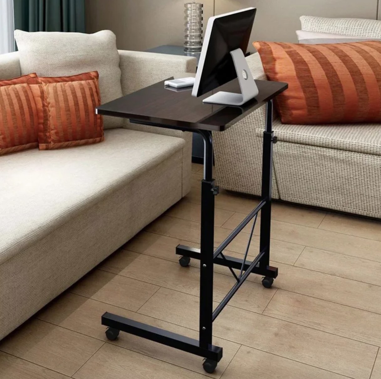The standing desk next to a couch