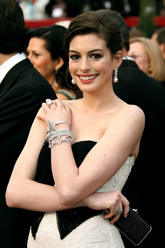 anne smiling in a strapless dress
