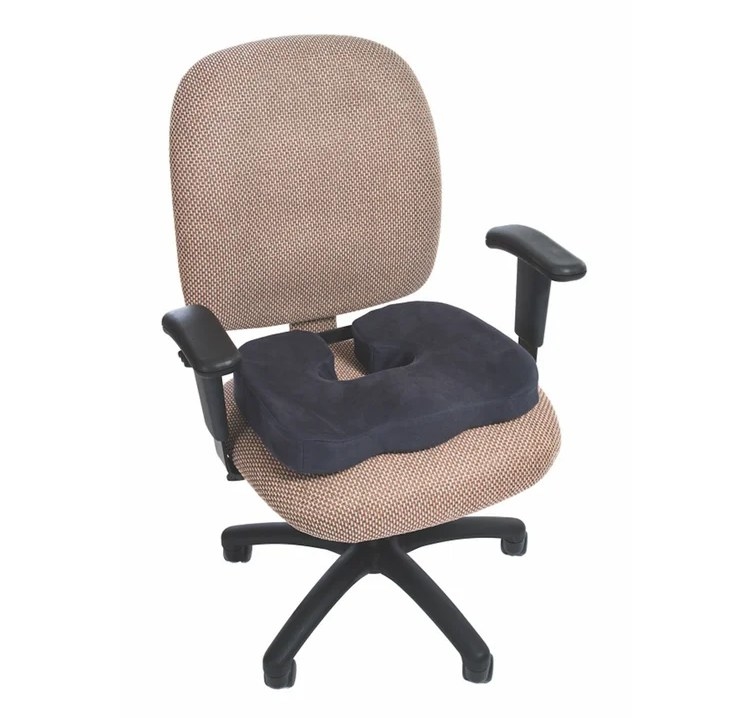 The seat cushion on top of a desk chair