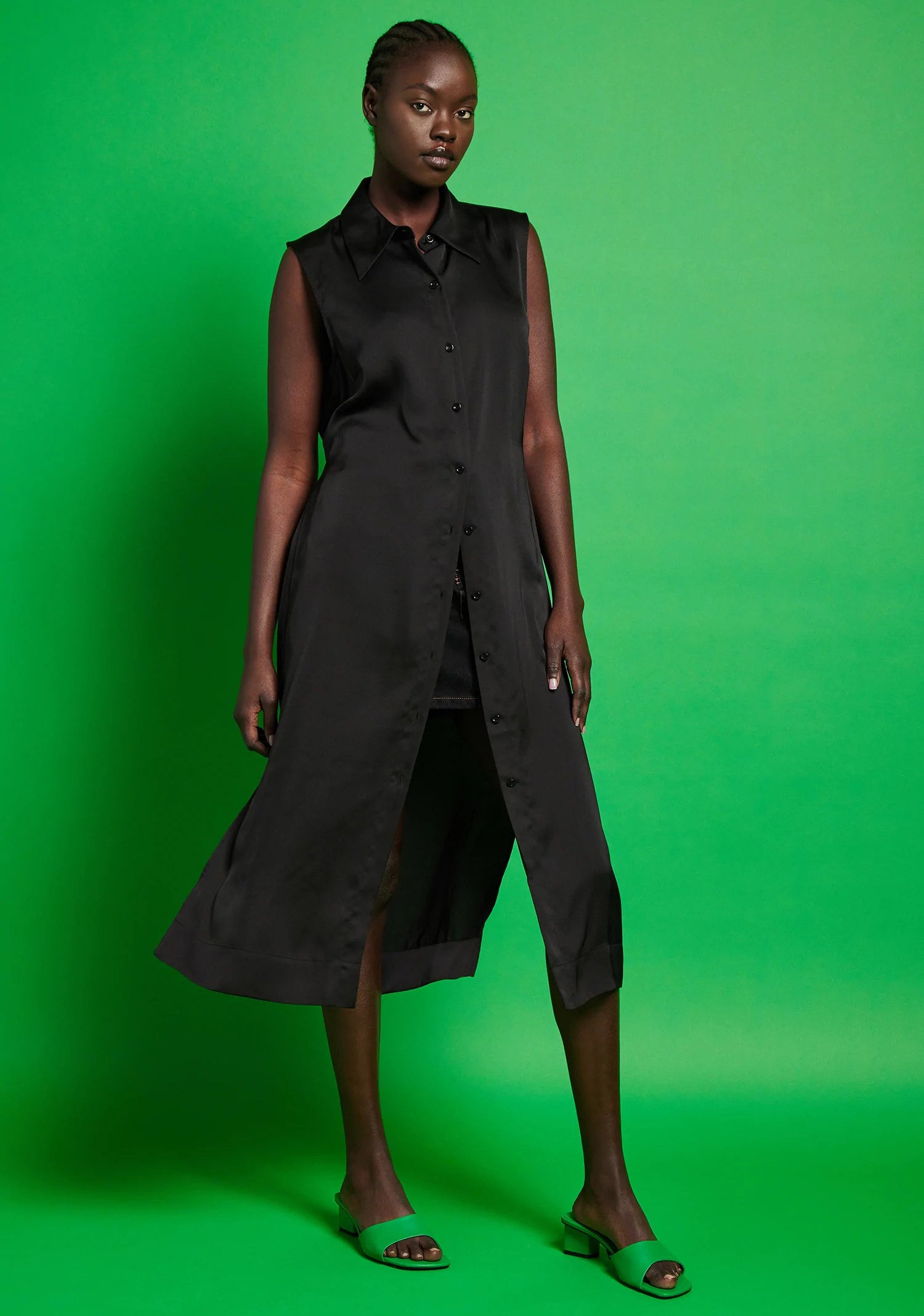 model wearing a black silk button down dress