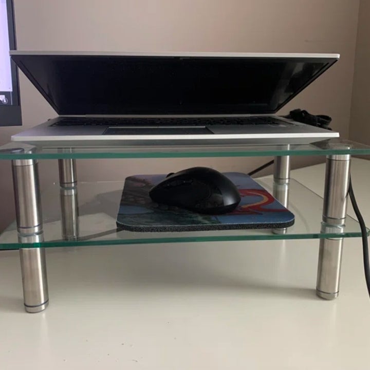 the risers double stacked on a reviewer's desk