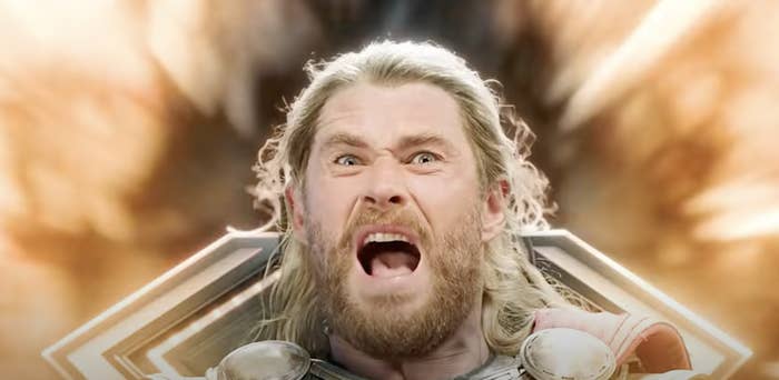 Thor screams while the room around him lights up