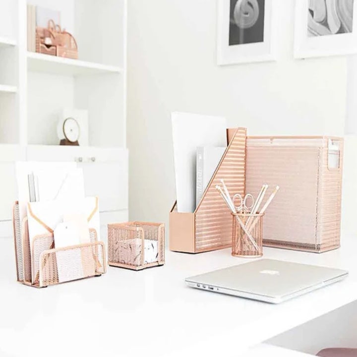 the set in rose gold on a desk