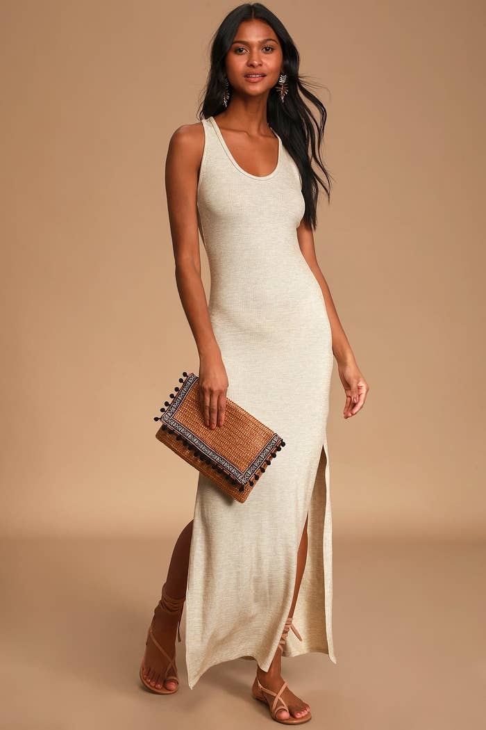 Model wearing beige ribbed maxi dress