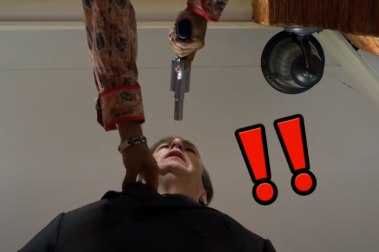 An episode still of a gun being pulled on Saul