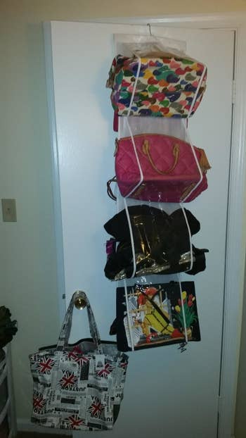 front view of the purse organizer hanging over a door