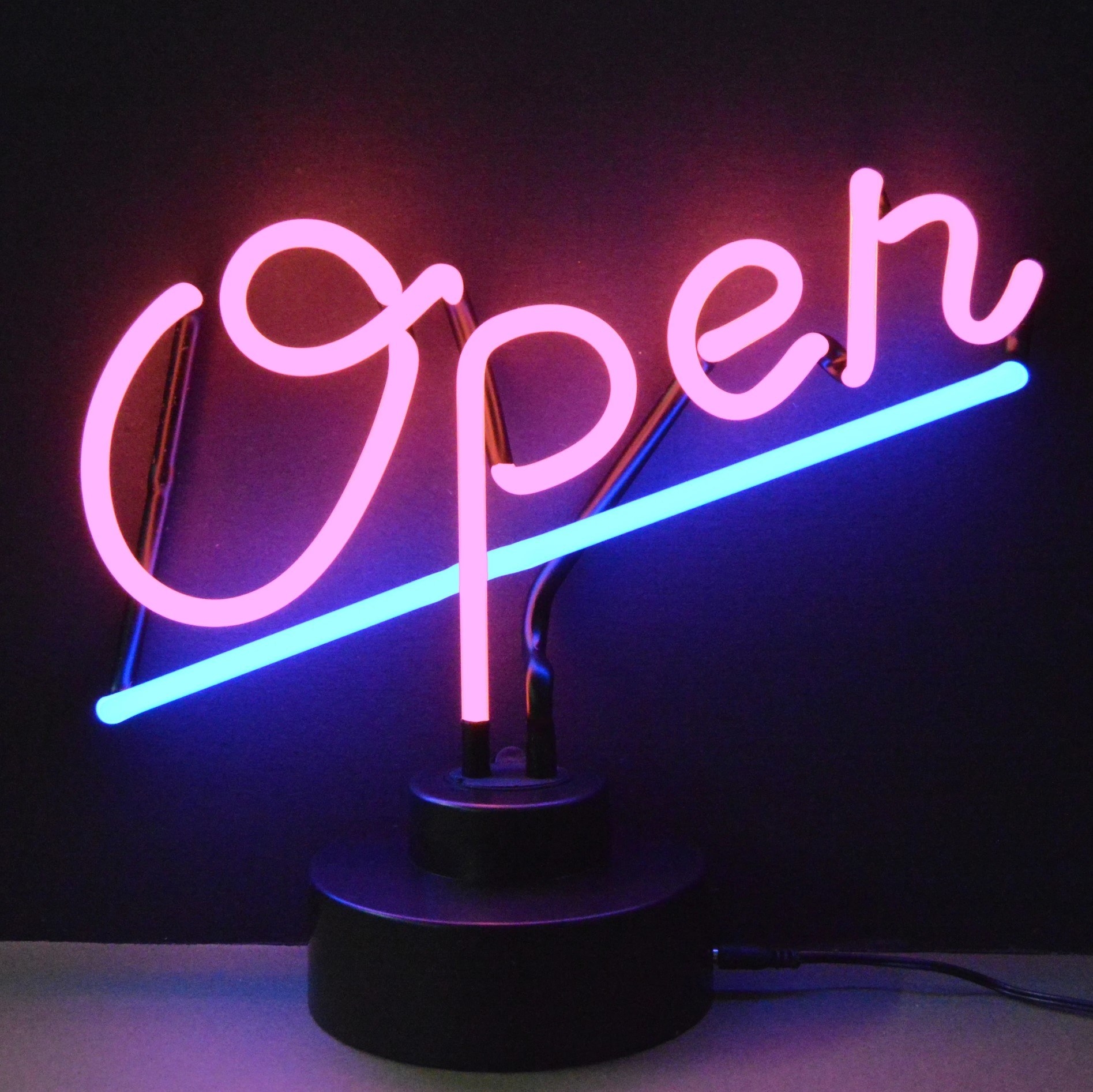 pink neon sign that says open