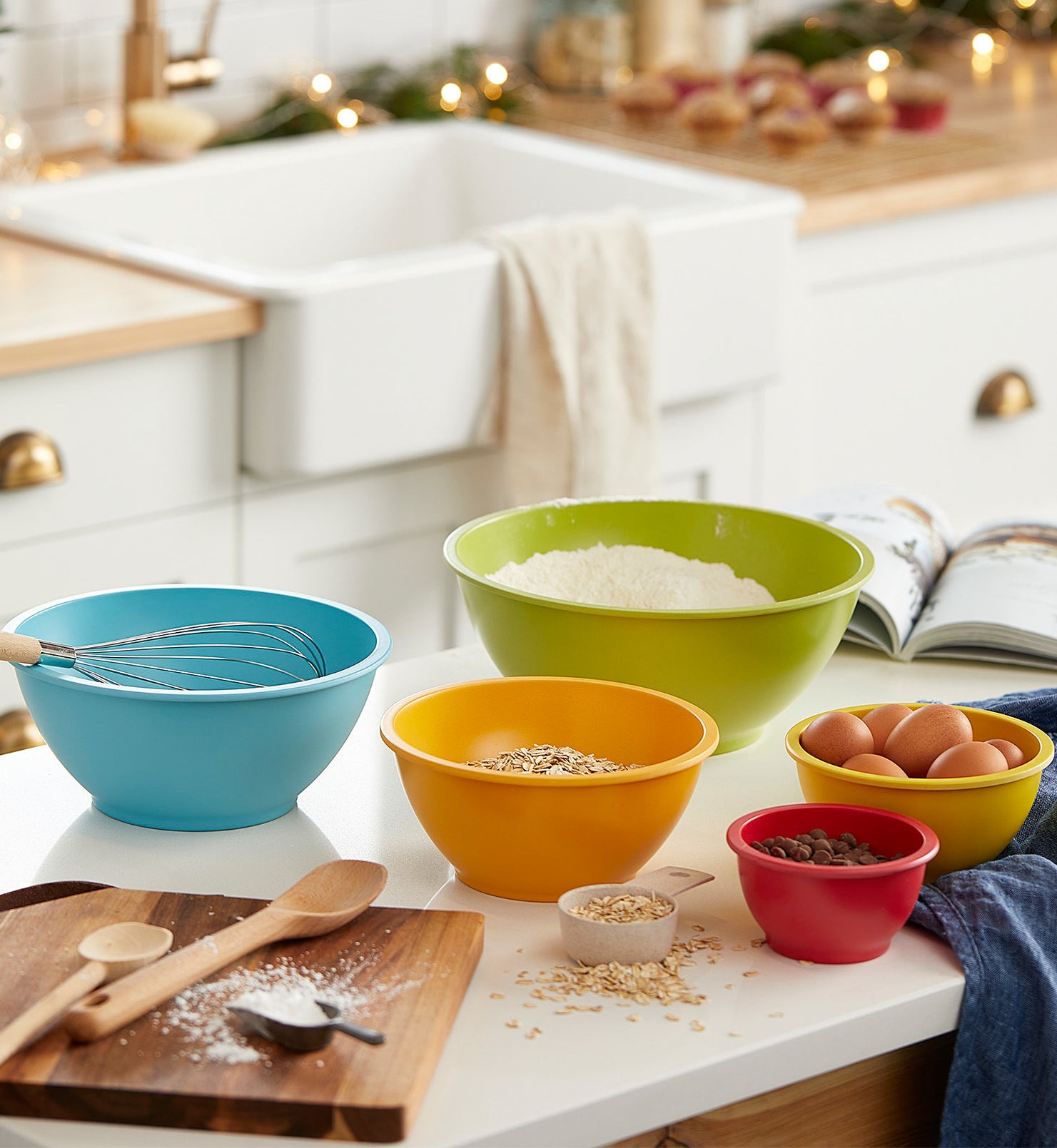 five colourful bowls on a counter
