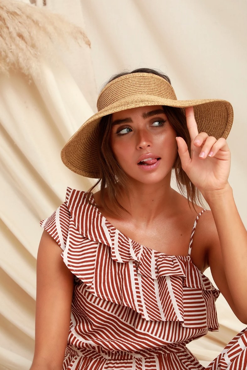 Model wearing straw visor