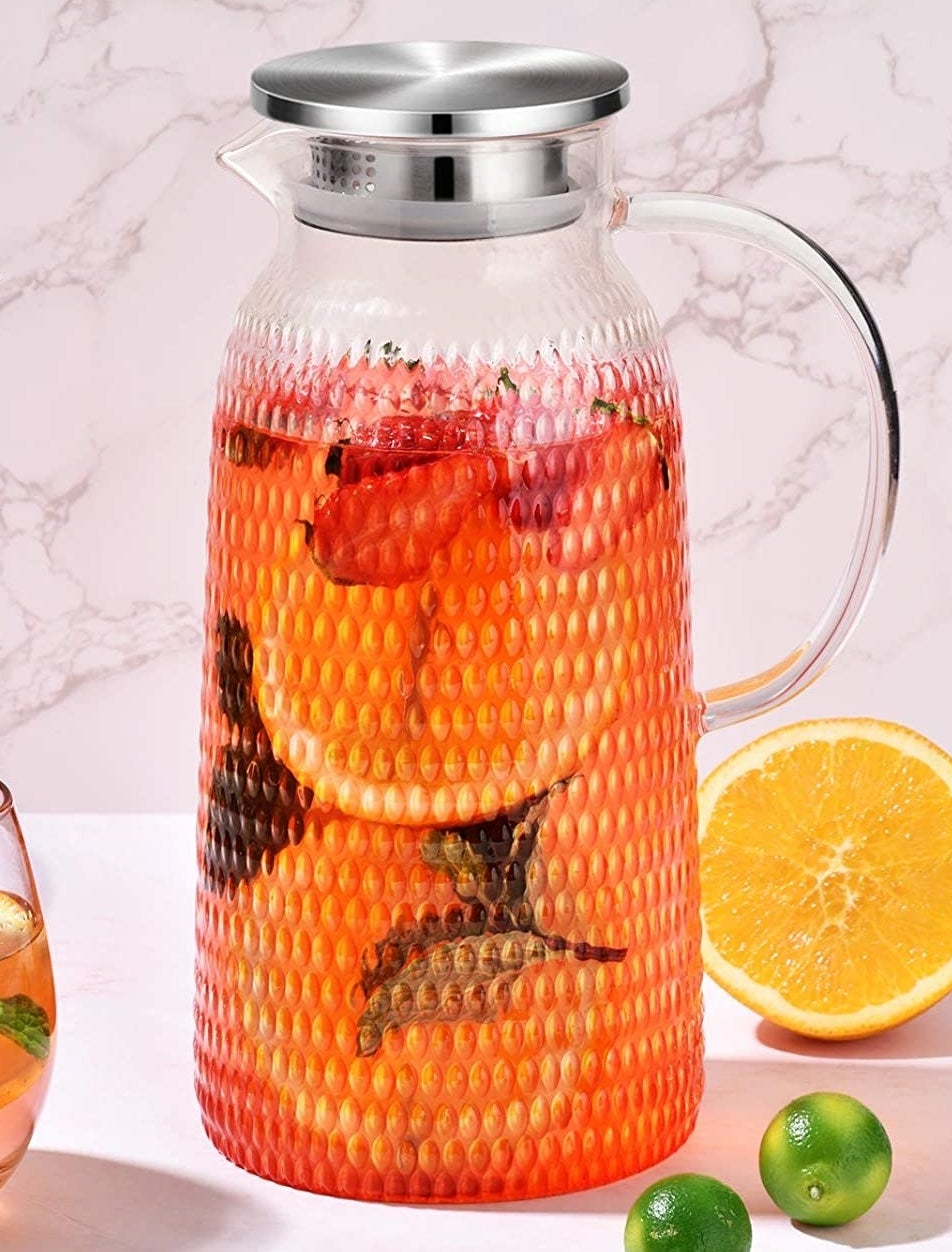 a pitcher filled with what looks like sangria