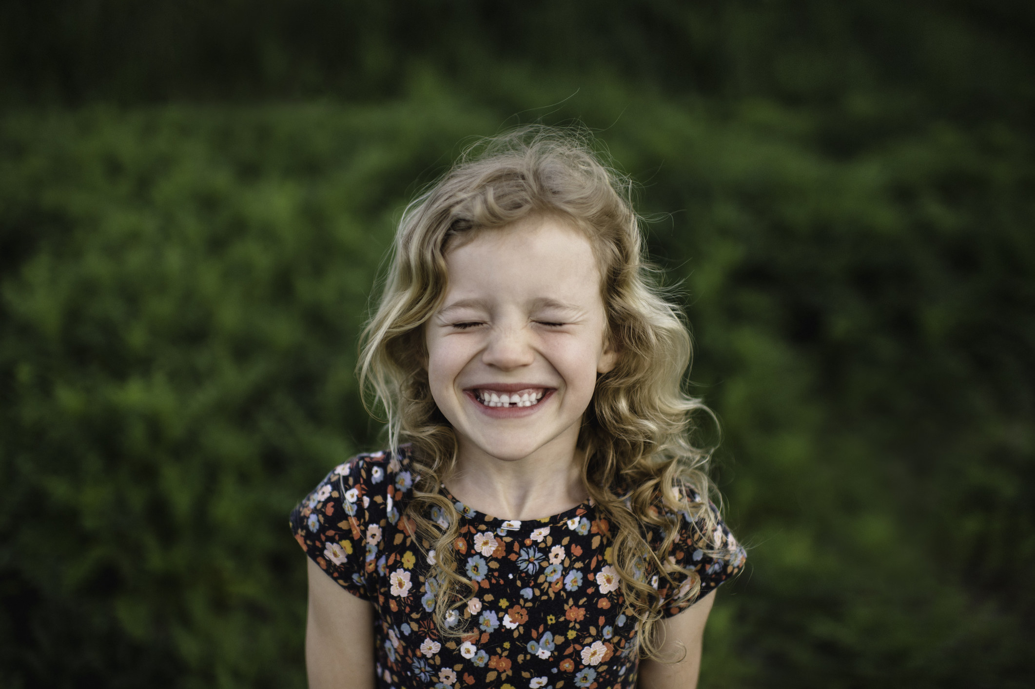 A little girl smiling