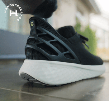 Gif of model slipping foot into Kizik shoes