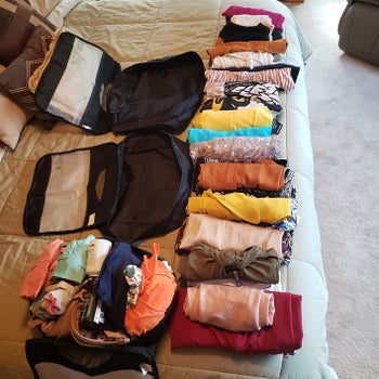 Reviewer's clothes before using packing cubes