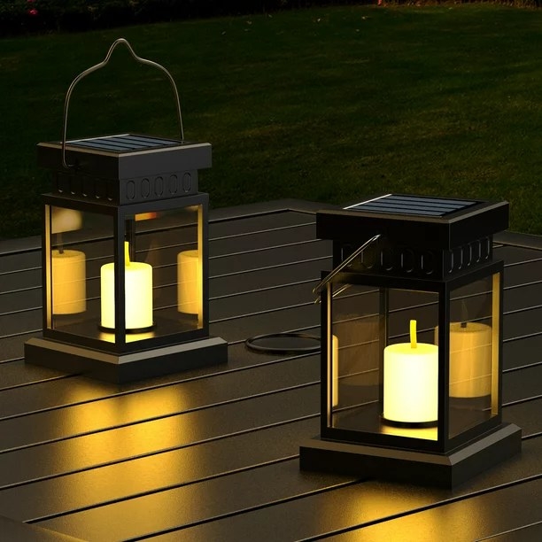 two of the lanterns on a table