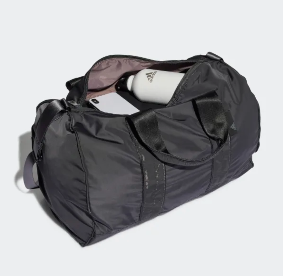 the duffel bag open to show how much stuff can fit inside